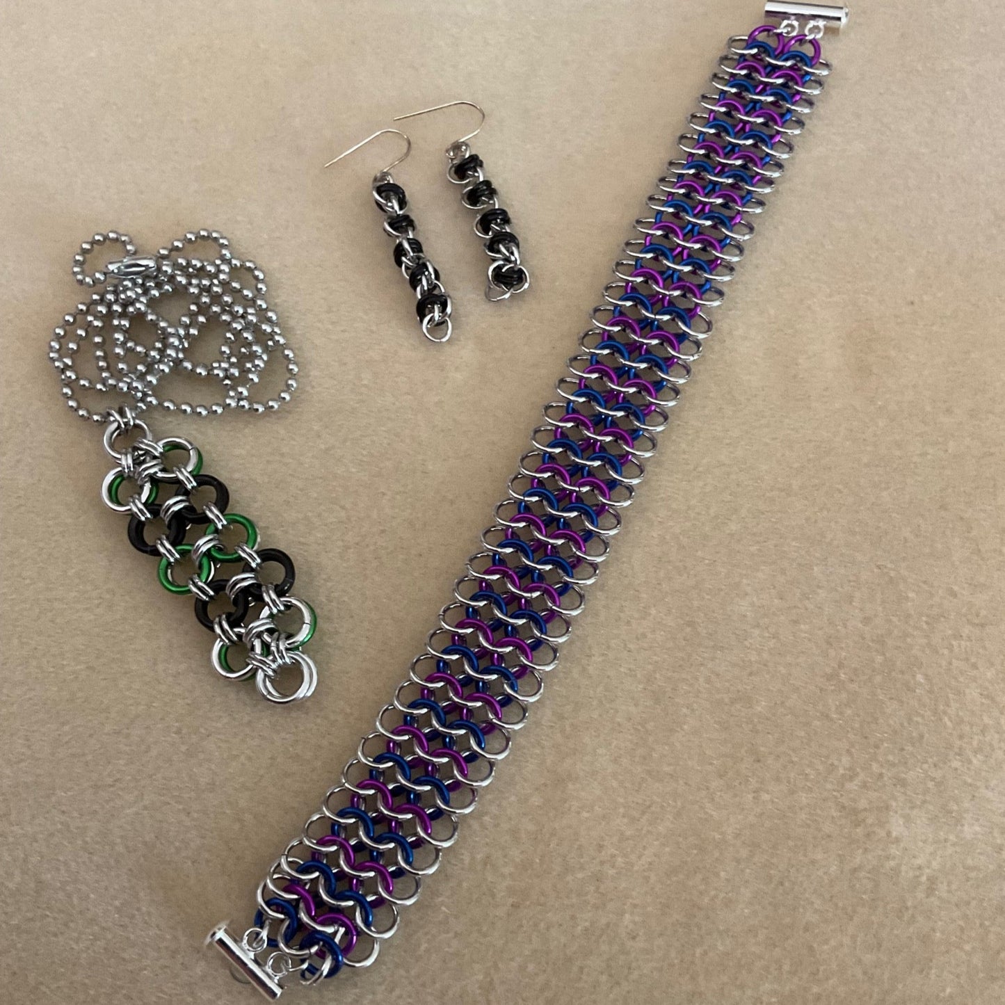 A TRIO OF CHAINMAILLE WEAVES
