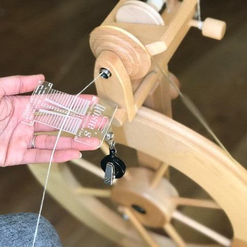 BEGINNER SPINNING AT THE WHEEL